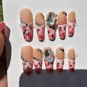 Chic Pink and Black Press-On Nails with Leopard and Marble Design